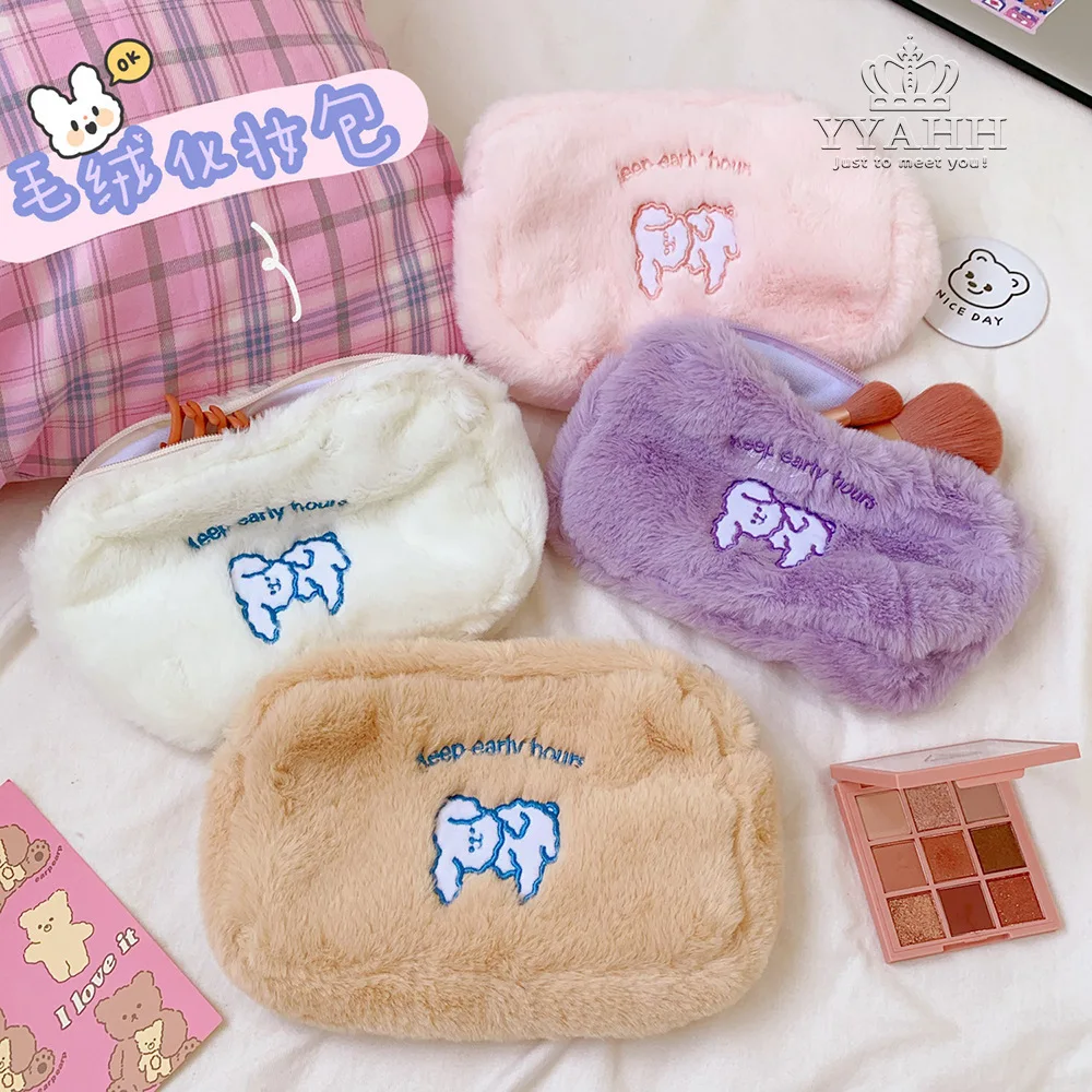 

An Instagram Photo of A Stuffed Dog with Embroidery and A Handbag for Daily Necessities