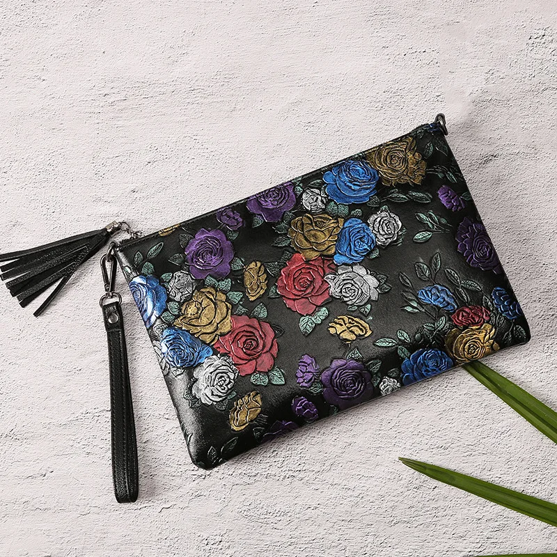 

The rose pattern carrying the fashionable cowhide grip lady envelope bag single shoulder across the trend. JIULIN