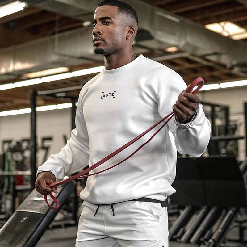 

Men Solid Colour Round Collar Sweater Long Sleeve Fitness Bodybuilding Men Clothes 2019 Drawstring Elastic Hem Casual T Shirt