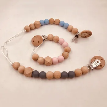 

The New Adjustable Holder for Nipples Baby Pacifier Clip Chain Baby Soother Wooden Pacifier Clip Molars Bite Toys AXA032