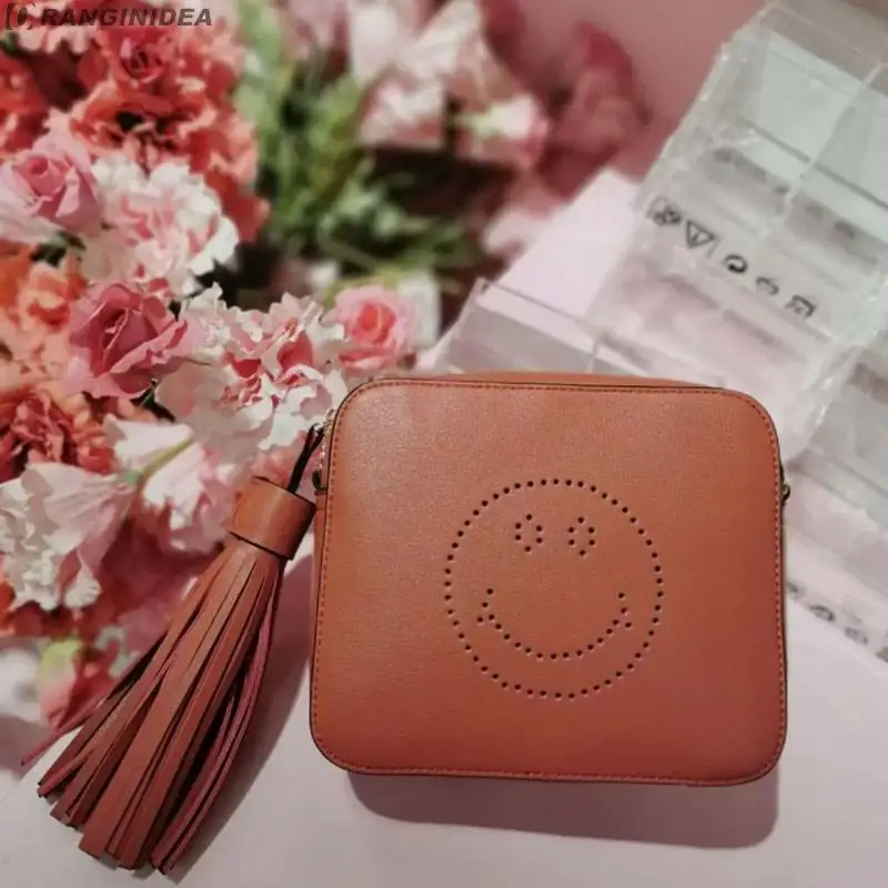 

The New 2022 His Little Party Bag Leather Fashion Handbags Hollow Out Smiling Female Temperament Bag Contracted Packet