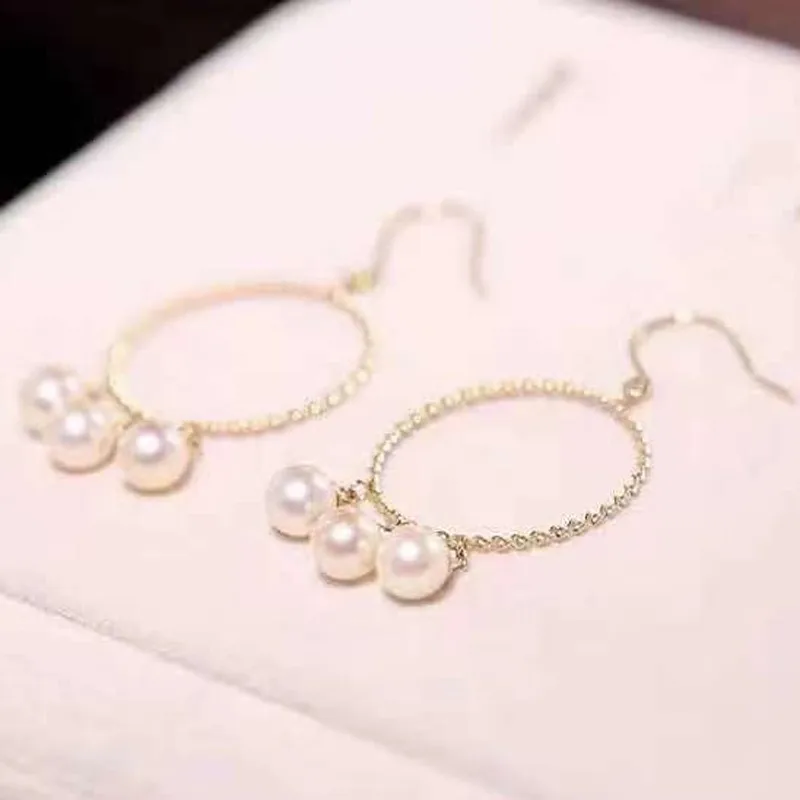 boucles-d'oreilles-pendantes-en-perles-accessoire-de-bijoux-design-classique-en-cercle