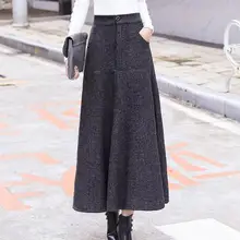 Теплая шерсть юбка А-образного силуэта Для женщин с металлической кнопкой Высокая Талия зима, ботинки с декором гофре шерстяные по колено юбки Femme DF943