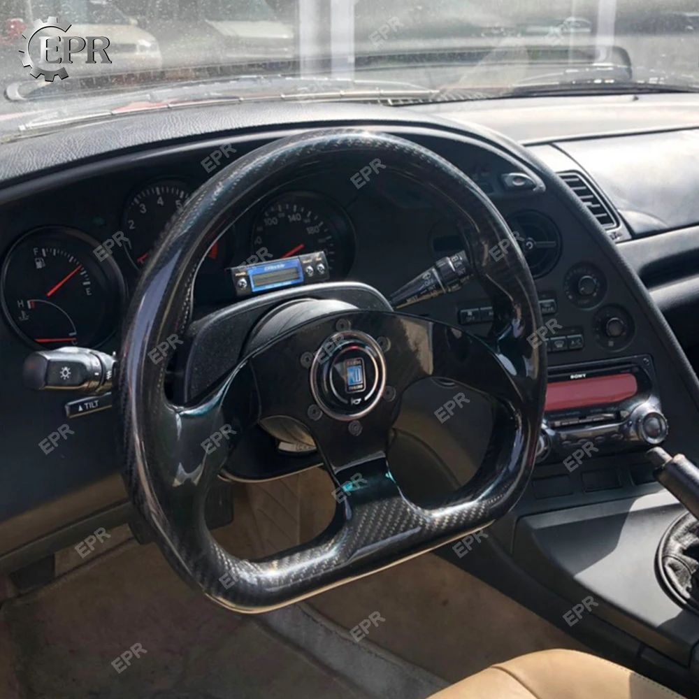 

Universal Glossy Carbon Fiber Flat Type Steering Wheel (320mm diamete, 6 bolts 70mm PCD (Same fitment with MOMO, OMP & Sparco)