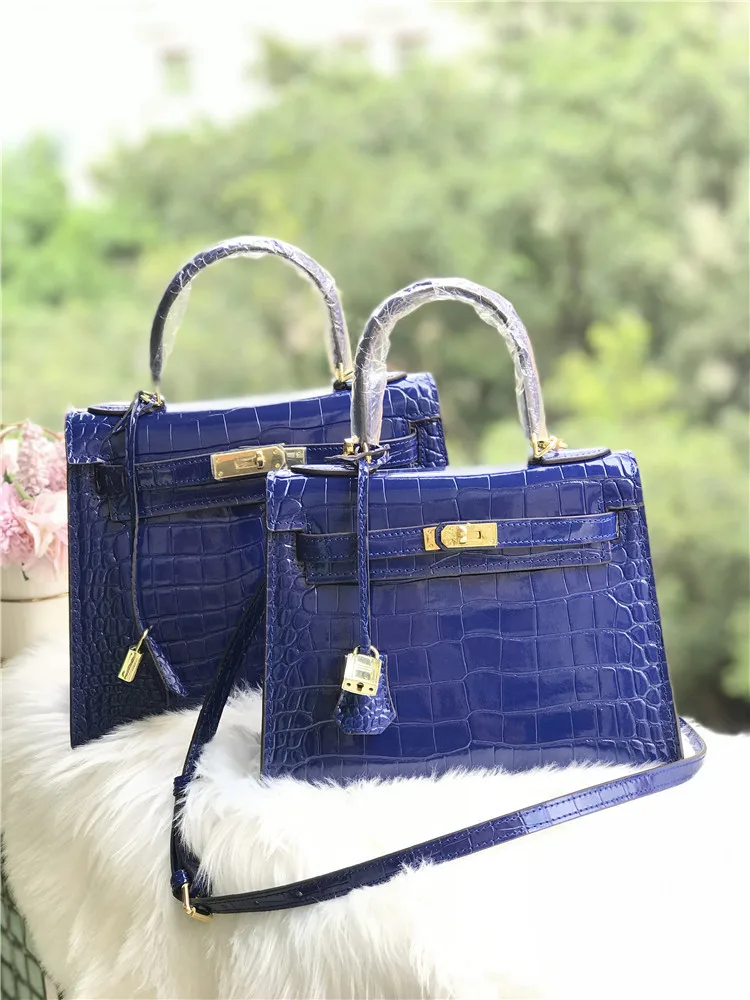 

Carefully selected designer 2020 leather women's Baotou head layer cowhide crocodile pattern shoulder slung kay bag