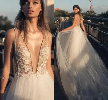 

2021 Boho Country Style Sexy Wedding Dresses Deep V Front and Back Beaded Lace Appliqued Tulle Long Bridal Gown New Custom Made