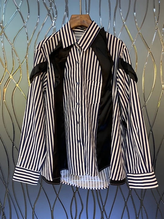 Early autumn new women's Lapel irregularly stitched long sleeve loose shirt 814