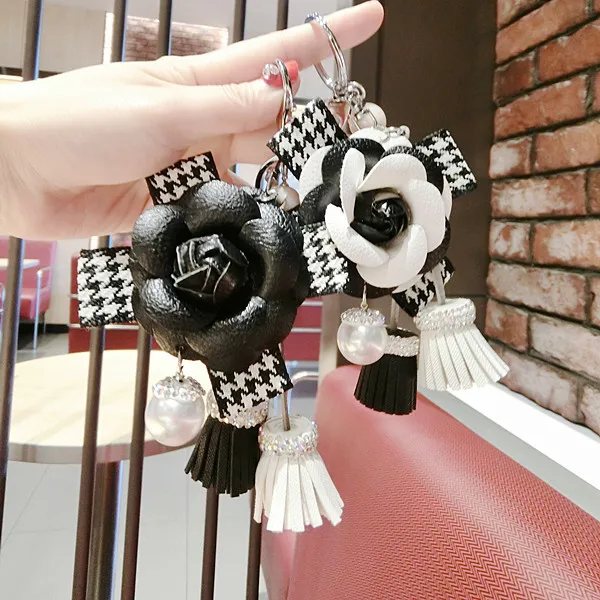 

Korean New Rose Flowers Key Chain Pearl Key Chains Ribbon Bow Chain Tassel Key Ring for Women Bag Car Pendant Jewelry Gifts