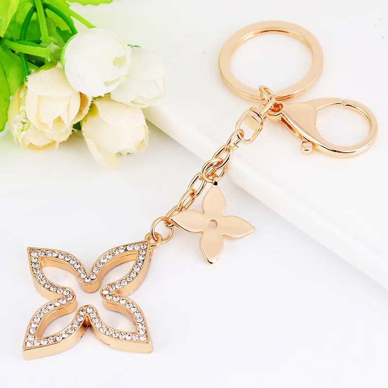 

New Creative Shamrock Keychain Golden Keychain Fashion Metal Keychain Car Bag Pendant Jewelry Beautiful Women's Gifts Wholesale