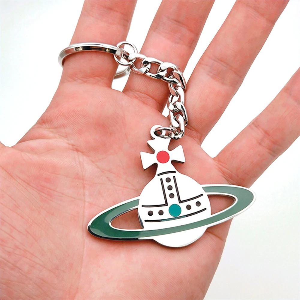 

XIAOJINGLING Colorful Enamel Saturn Planet Orbit Keychain Lover's Jewelry Gift Cross Saturn Charms Keyring Bag Car Key Holder