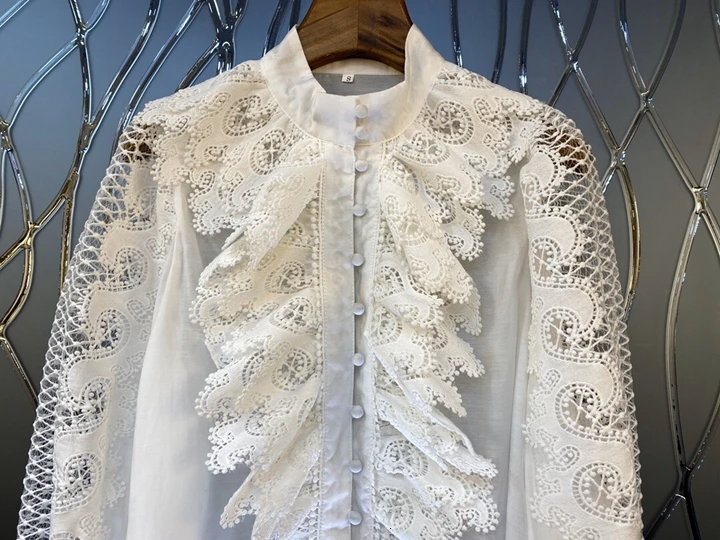 early 019 autumn new female small stand collar embroidery irregular stitching hollow perspective long-sleeved shirt 1011