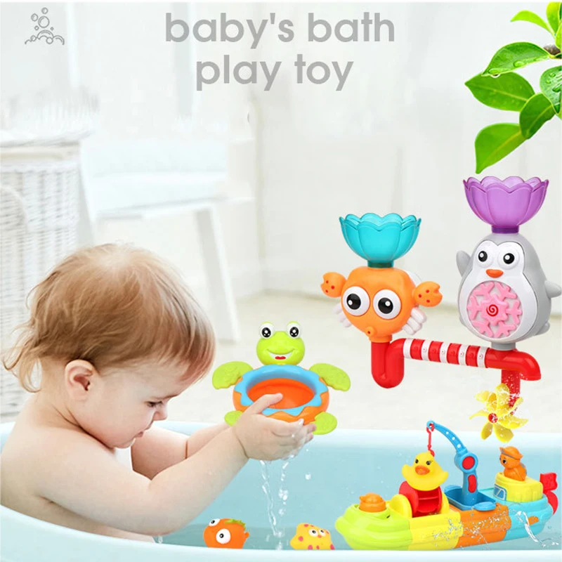 Baratos Juguete de baño para niños, herramienta de pulverización de agua para baño, característica de dibujos animados, 3 fuentes, ventosa, ducha de agua, juguete para niños