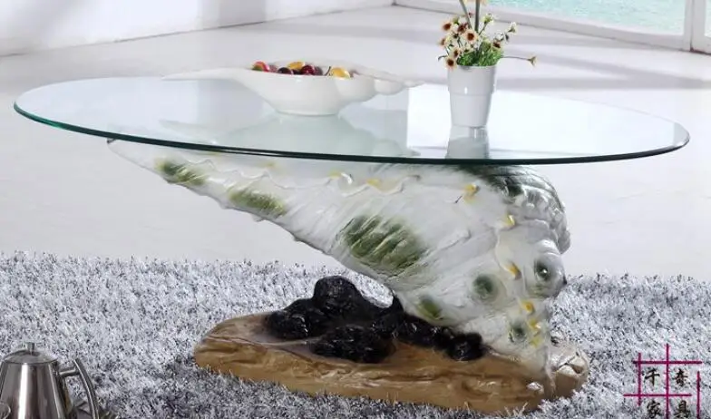 

Mermaid furniture round tea table.. Toughened glass tea table personality. The tea-table.