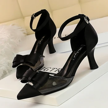 

New Korean version of shallow mouth pointed transparent stitching satin bow hollow word with female sandals