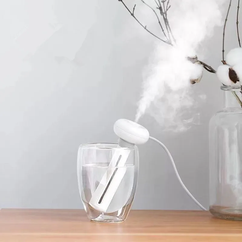 

Portable Ultrasonic Mist Maker Aroma Diffuser Air Humidifiers White Adjustable Height Donut USB Humidifier for Home or Office