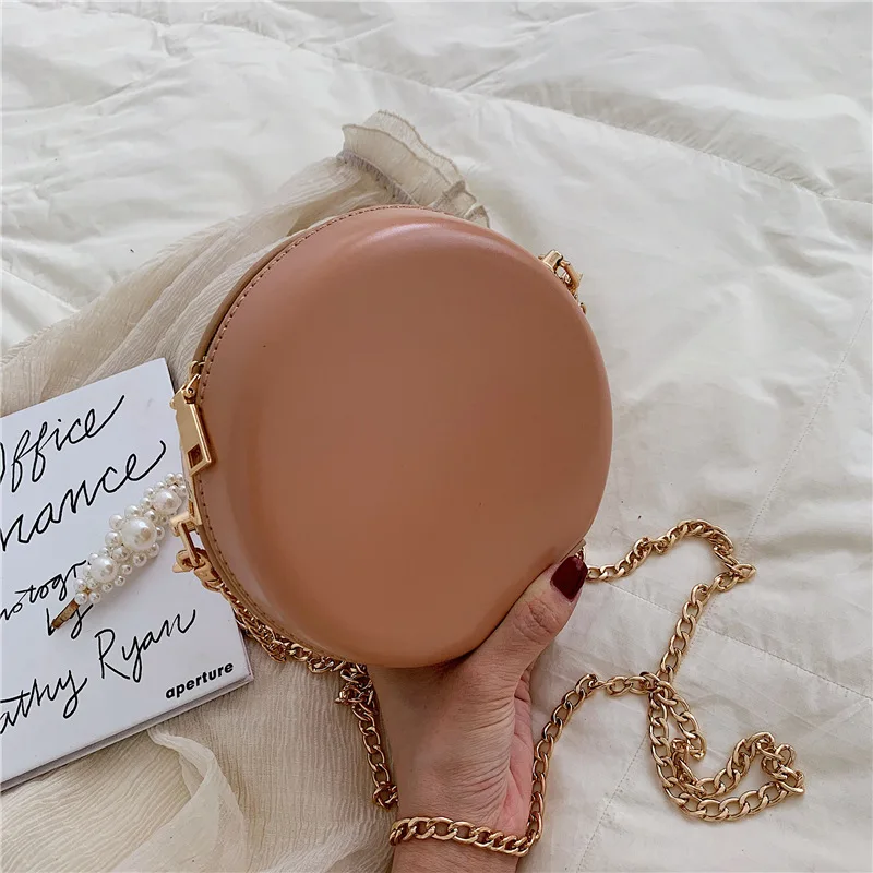 

2019 spring and summer new silica gel hard shell solid color chain small round bag girl lovely single shoulder slant