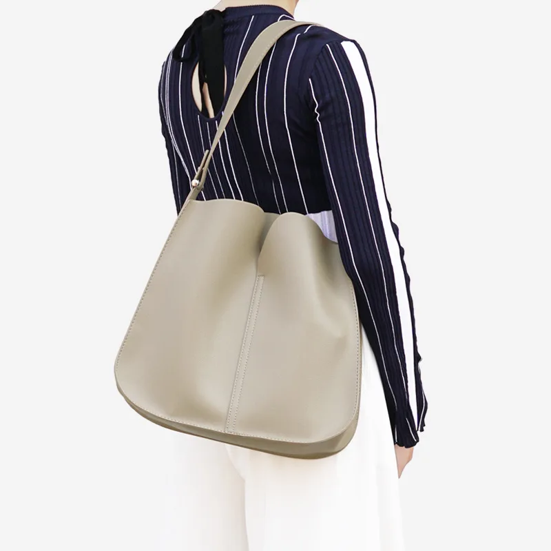 

Fashionable women's bag 2020 new spring and summer pure color mother bag Korean version simple PU one-shoulder slung bag