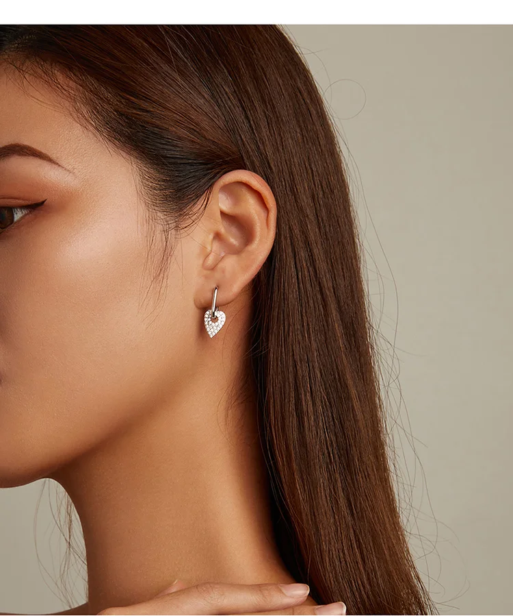 Heart Rectangle Hoop Earrings | S925 Sterling Silver | Go Glam Girl 7 Heart Rectangle Hoop Earrings | S925 Sterling Silver | Go Glam Girl - Show your style with the delicate Heart Rectangle Hoop Earrings. Hand-finished in sterling silver, every hoop earring has a heart dangling on it and encrusted with small sparkling zircons. These dreamy earrings, full of a romantic atmosphere will bring mood and beauty to your day. Perfect gift for mom, sister, grandmother, friend or yourself. | 🚚 Free Standard Shipping 7-30 days | 🥇 Top Quality Product | 💎 100% S925 Sterling Silver | 🛡️ 100% Safe & Secure checkout