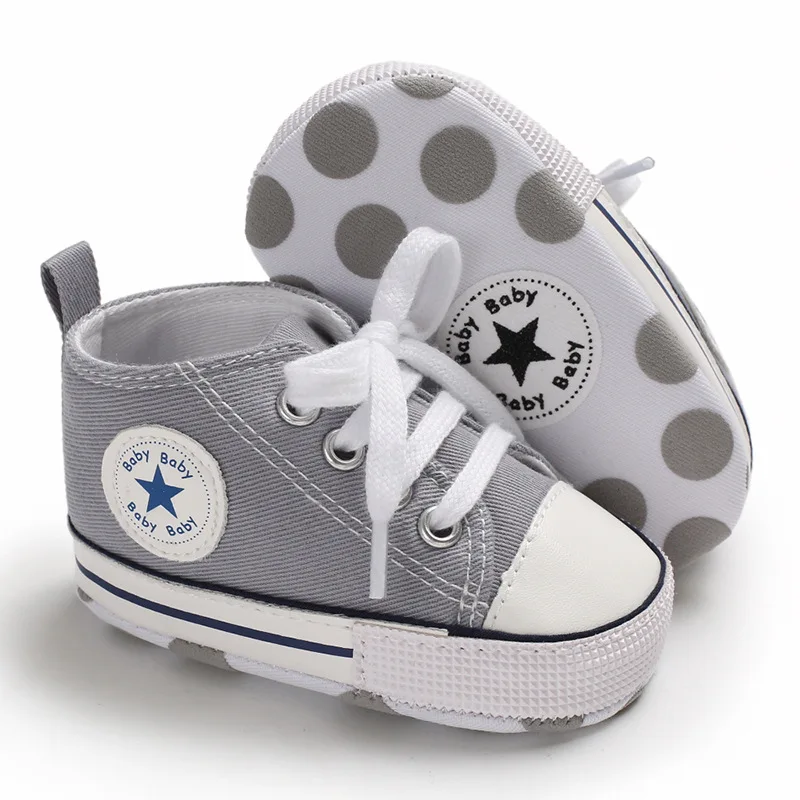 white canvas baby shoes