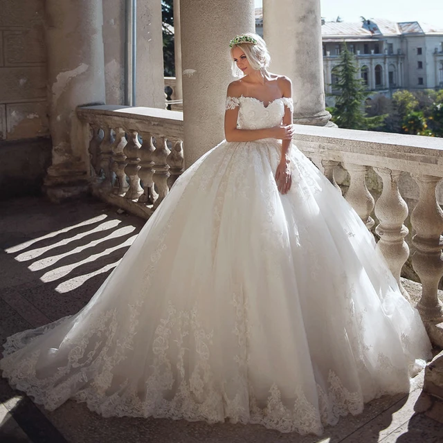 Designer V-neck Wedding Dresses with beaded Lace by Darius