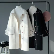 Winter new women coat Korean women's wool coat retro lamb hair in the long winter coat women lapel long sleeve coat