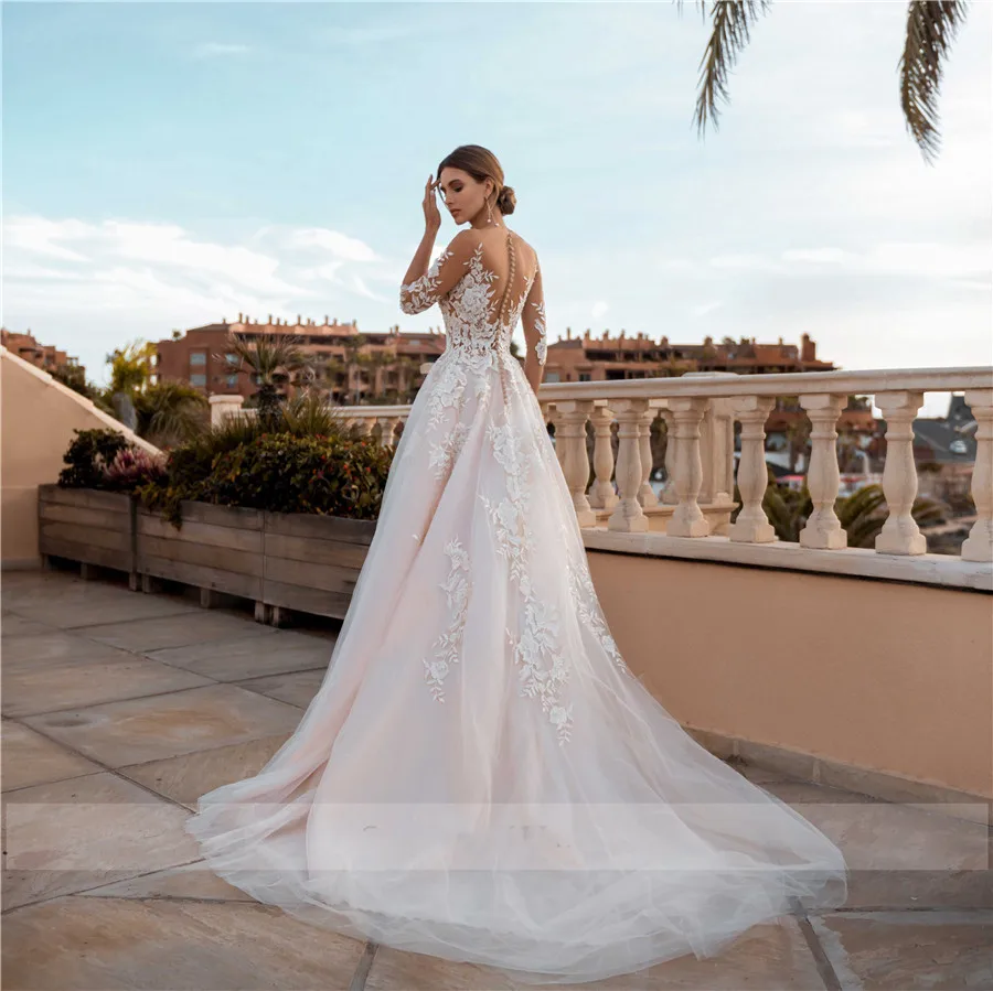 Sheer-3-4-Sleeves-See-Through-Floral-Applique-Blush-Wedding-Dress-Sexy-Illusion-Lace-Wedding-Dresses.jpg_.webp Sheer-3-4-Sleeves-See-Through-Floral-Applique-Blush-Wedding-Dress-Sexy-Illusion-Lace-Wedding-Dresses.jpg_.webp