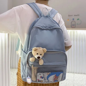 

DCIMOR New Waterproof Nylon Women Backpack Net front pocket Leisure backpacks Teenage girl bear schoolbag Lovely Book Mochilas