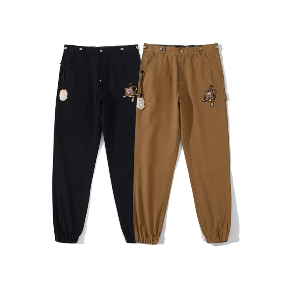 

20SS European and American tide brand embroidery tiger head gold bottle opener tooling men's casual high street trousers