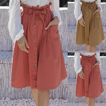 

Summer new solid color knotted large pocket single-breasted skirt sweet tunic belt bowknot skirt women beach skirt tie skirt
