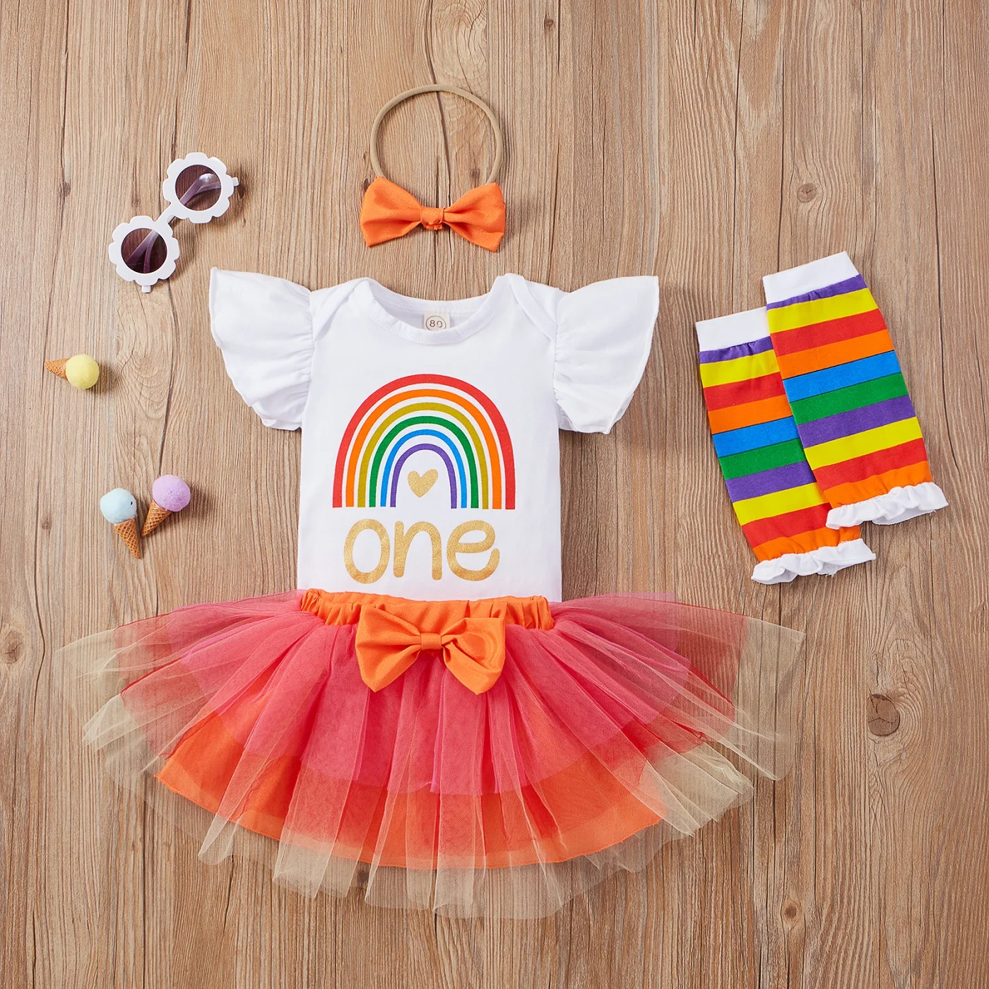 

4Pcs Toddler Baby Girls Summer Outfits Rainbow Flared Short Sleeves Romper + Tutu Skirt + Leg Warmer + Headband Clothes Set