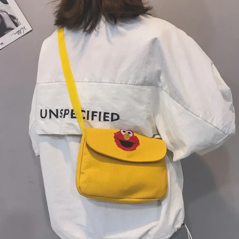 

Canvas small bag female 2020 new Korean version of ins Sesame Street shoulder bag student net red wild messenger bag