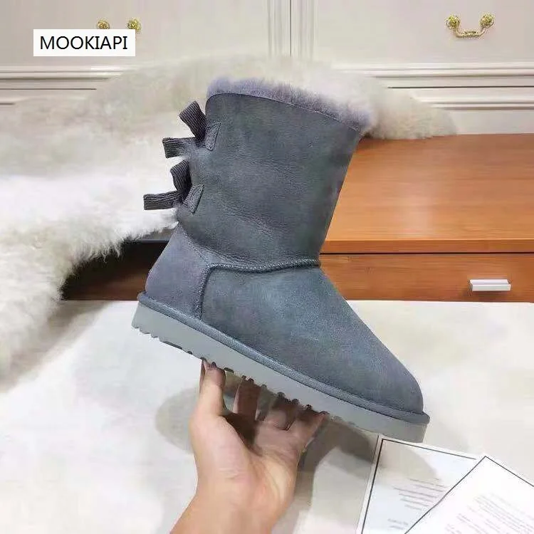 

In 2019, China's latest high-quality women's snow boots, real sheepskin, 100% natural wool, women's shoes, four colors, free