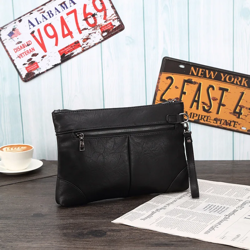 

Europe and the United States retro rivet clutch bag Korean version of soft PU Amazon South America clutch bag clutch bag