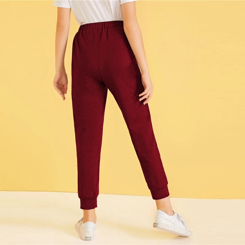 SHEIN для малышей однотонные рваные укороченные Повседневное спортивные штаны детские штаны Осенняя уличная одежда с эластичной резинкой на талии брюки для девочек-подростков