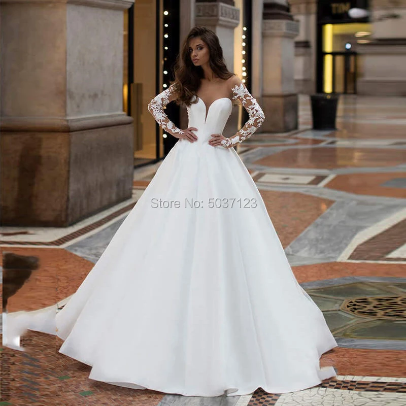 

Satin Ball Gown Wedding Dresses Sweetheart Long Sleeves Lace Appliques Button Illusion Floor Length Bridal Gown Custom Made