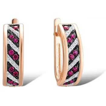 

Lucas gold earrings with rubies and diamonds in red gold