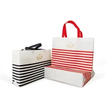 В настоящее время доступны полосы не-тканый ламинированный мешок экологически чистая одежда Обувная коробка мешок нетканый мешок экологически чистый