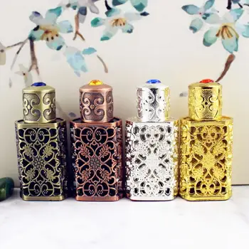 

3ml Antiqued Metal Perfume Bottle Arab Style Hollow-out Essential Oils Bottle Middle East Glass Dropper Bottle WB1960