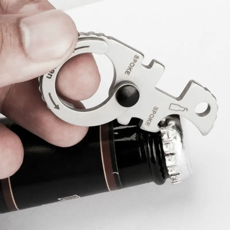 

Creative Multi-function Keychain Opener Mobile Phone Holder Spoke Wrench Outdoor Multi-function EDC Tools