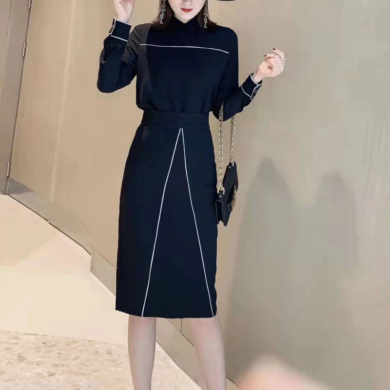 black shirt blue skirt