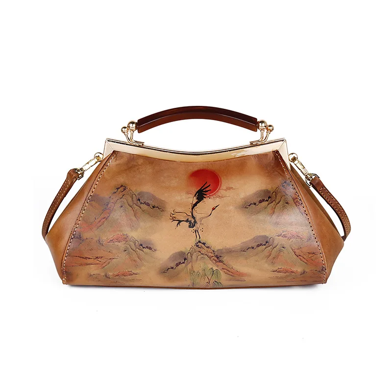 

The manufacturer directly sells the first layer of cattle hide retro relief red sun crane hand-brushed color handbag with obliqu