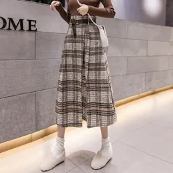 2021 nova venda quente de cintura alta saia xadrez para as mulheres outono e inverno grande swing mid length a line saia moda retro todos os jogos