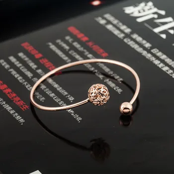 

Europe and the United States new simple personality fashion geometric opening hollow flower ball ladies bracelet wholesale