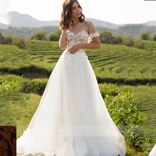 

Backless Mermaid Wedding Dresses Illusion O Neck Off Shoulder Appliqued Luxury Crystal 2021 New Arrival Robe De Mariee Custom