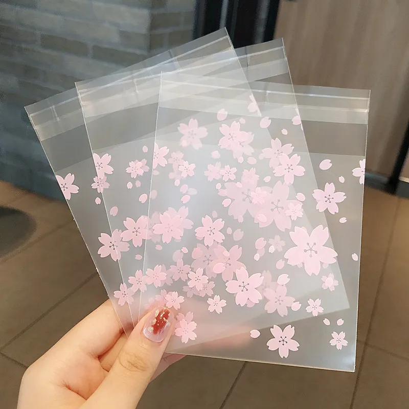 100pcs/lot 3 Size Transparent Flower Image Packaging Bags Self-adhesive Plastic Bag For Jewelry Rings Earrings Necklace Gift Bag 50pcs transparent self sealing bags resealable pouch jewelry packaging storage earrings rings necklace display plastic bag