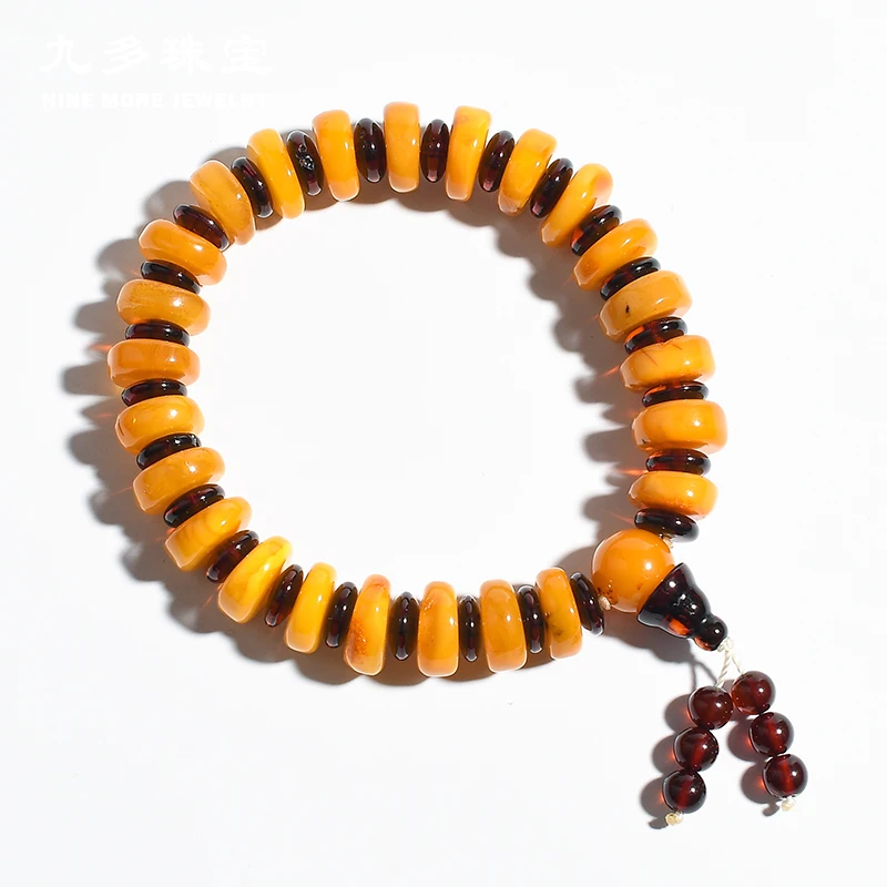 

Wax bracelets gold puffer pure natural amber bracelet chicken oil yellow ore multi-treasure men and women models elastic rope