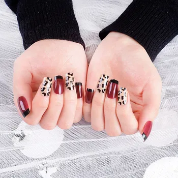 

Wear a Manicure Patch Stick Completely Social Fake Nails 24 Piece Dark Red