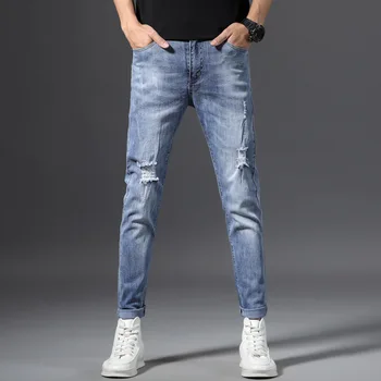 

Popular logo hole in male han edition cultivate morality jeans flash foot trousers new elastic 9 points of light color