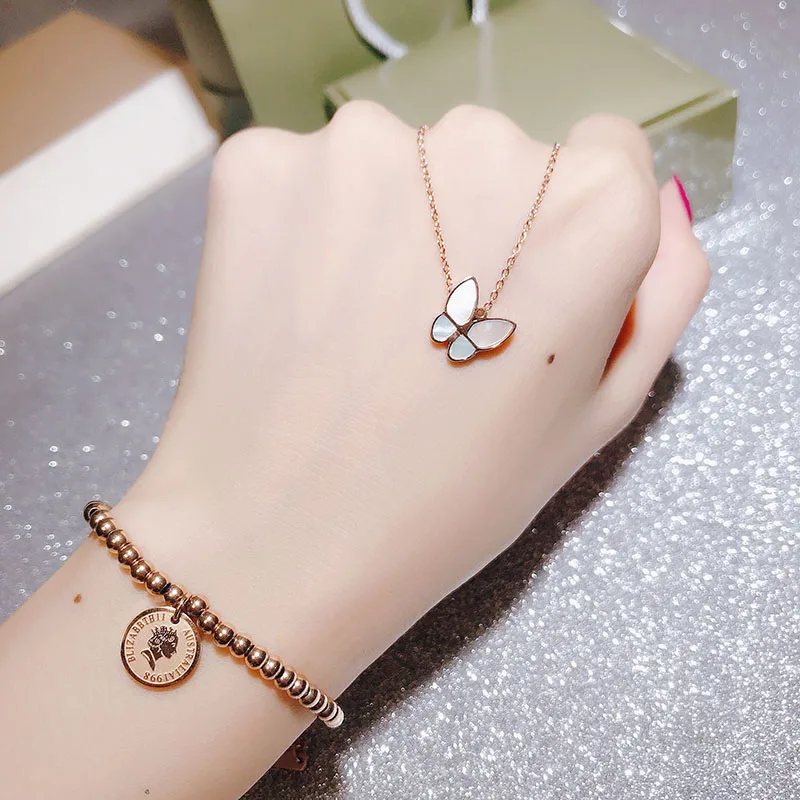 Ожерелье YUN RUO из розового золота с натуральной ракушкой и бабочкой женское