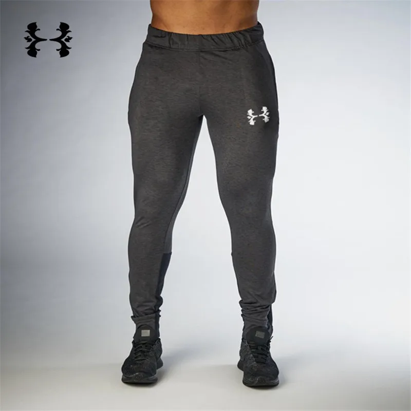 

2019 New Tight Packet Bodyboulding Gyms Pants Brand Clothing Polyester Trousers Fitness Jogger Sweatpants Men High Quality